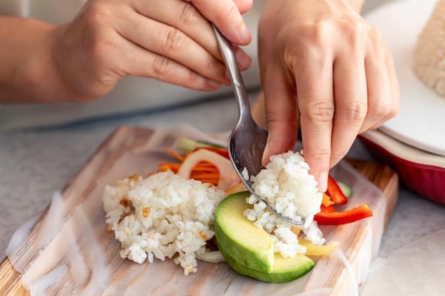 A person is shown portioning out ingredients like cooked chicken, vegetables, and rice into individual freezer bags. They're working on a clean kitchen countertop with various containers and utensils organized around them.