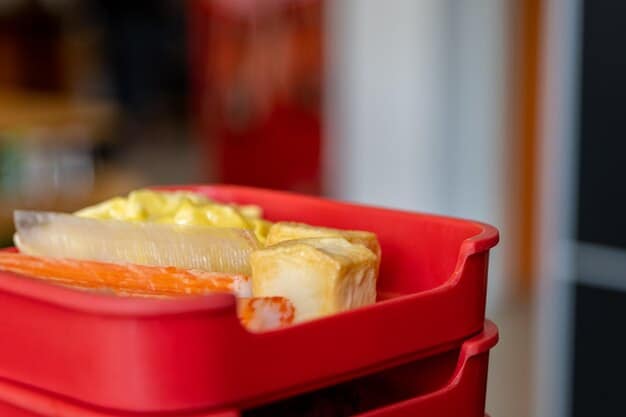 A close-up shot of various freezer-safe containers and bags filled with colorful meals like spaghetti sauce, chili, and cooked chicken. The containers are neatly labeled with the contents and date.