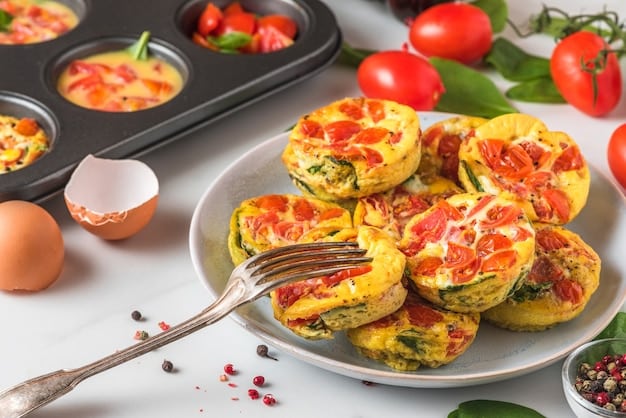 A close-up of a person preparing a colorful frittata with leftover roasted vegetables and cheese, showcasing a creative and simple way to reuse leftovers.