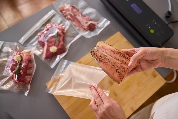 A person using a vacuum sealer to package portions of meat. The vacuum sealer is modern and easy to use, and the meat is neatly arranged in the bag. The setup is clean and professional.