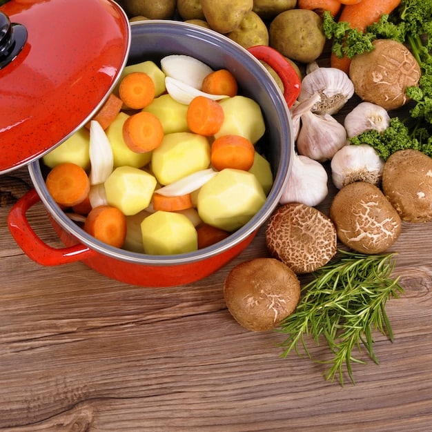 A bowl of vibrant homemade vegetable broth simmering on a stovetop, garnished with fresh herbs, showcasing the use of vegetable scraps for a nutritious and flavorful base.