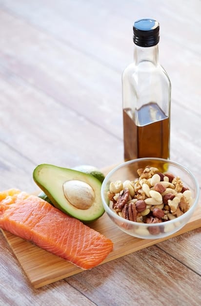 A close-up shot of various cholesterol-lowering foods, including oats, almonds, avocados, salmon, and olive oil, arranged artfully on a wooden surface.