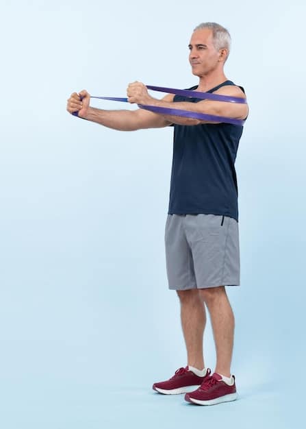 A person using a resistance band to perform external rotation exercises for their shoulder. Proper form is emphasized.