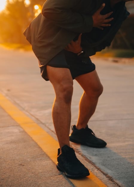 A close-up of a runner's legs showing proper stride length. The image should illustrate the foot landing directly underneath the hip with a slight bend in the knee.