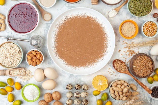 A collage of different protein sources, including chicken breast, eggs, tofu, lentils, and Greek yogurt, arranged to showcase variety and options for protein intake.