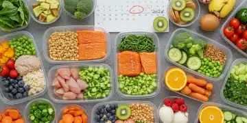 Colorful 7-day meal prep containers with healthy food for energy and savings